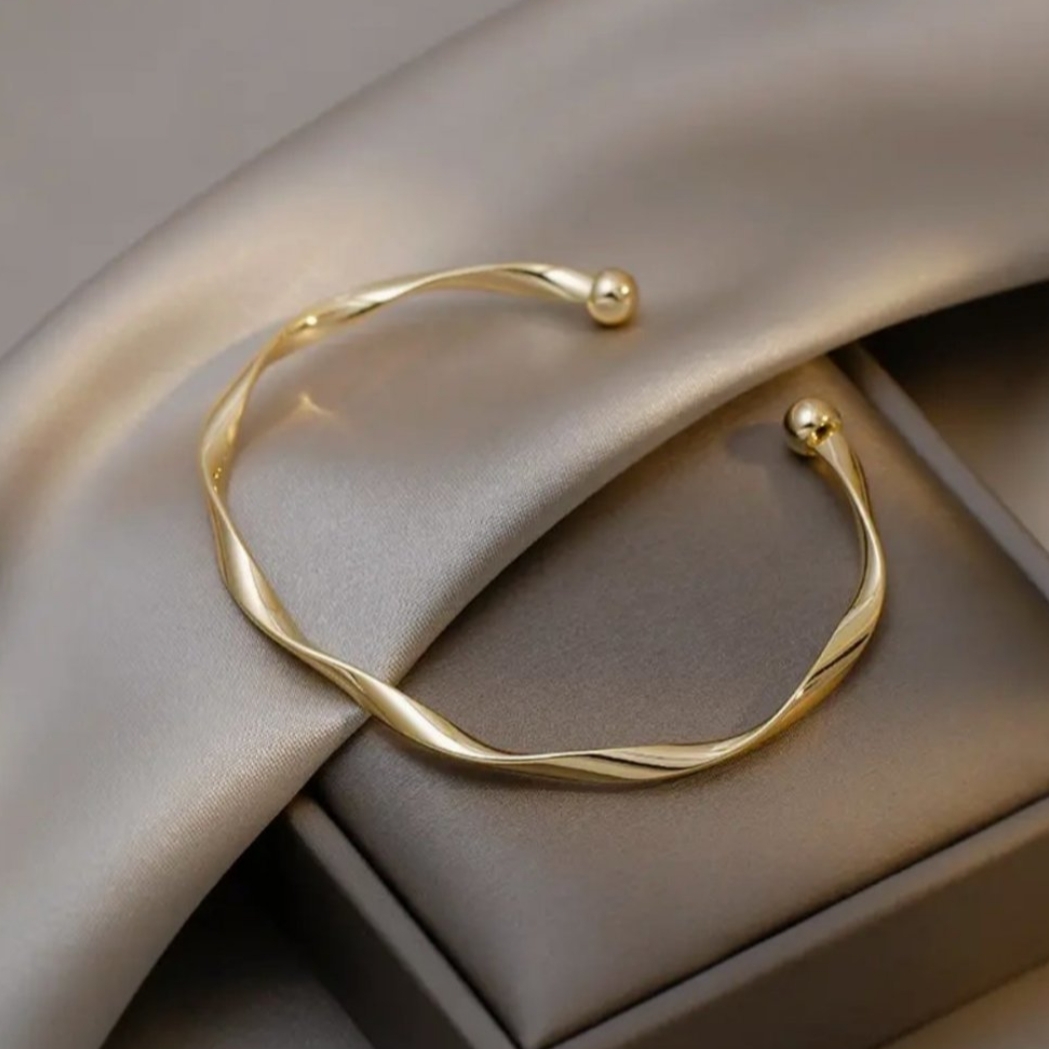 18 Kt Gold Over Titanium Twist Bangle